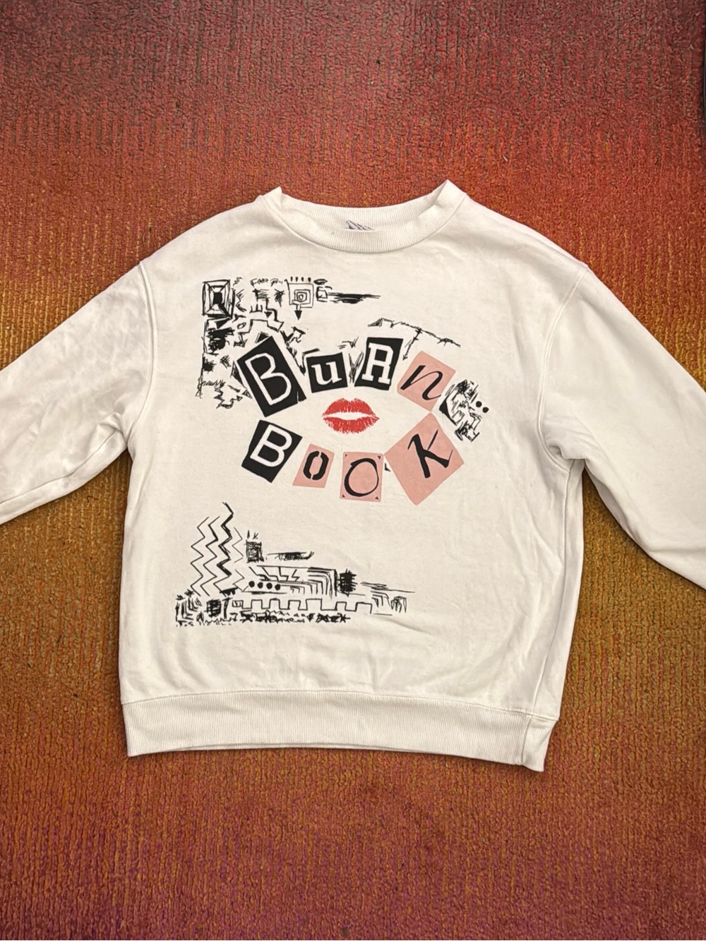 Womens’ Mean Girls Burn Book Graphic Crewneck with Pink Accent and Red Lips